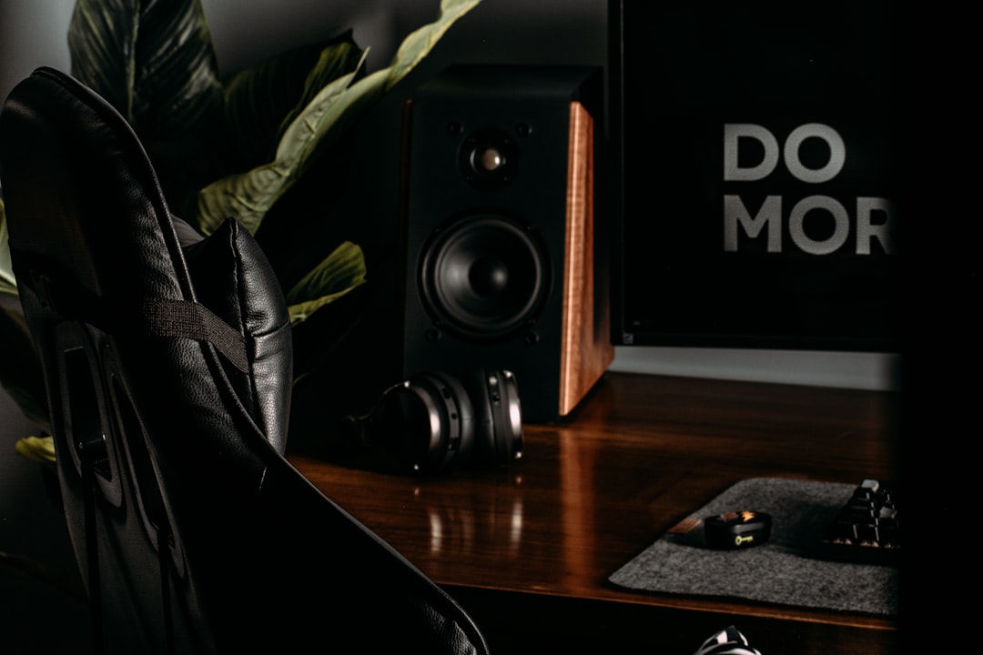 a black speaker on a table