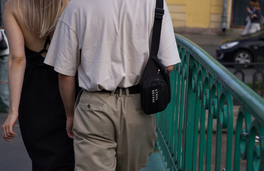 Conclusion by Headphone Brands A man and a woman walking down a street